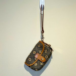 Vintage Dooney and Burke Wristlet. Brown, black and tan.